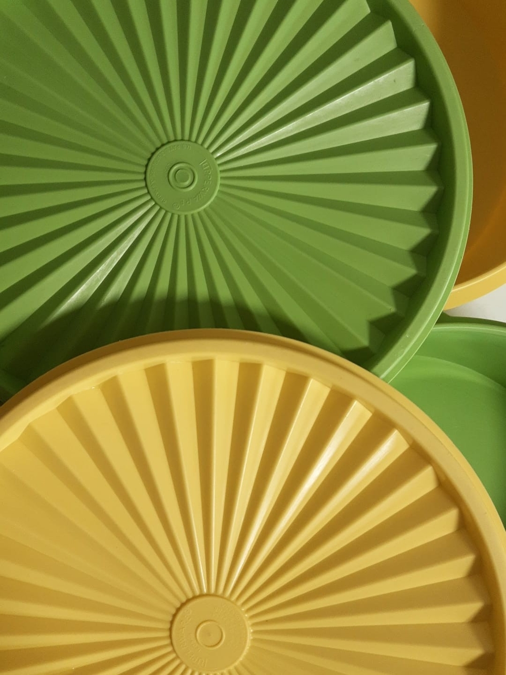 Set of Round Tupperware Sunburst Canisters in Yellow and Green